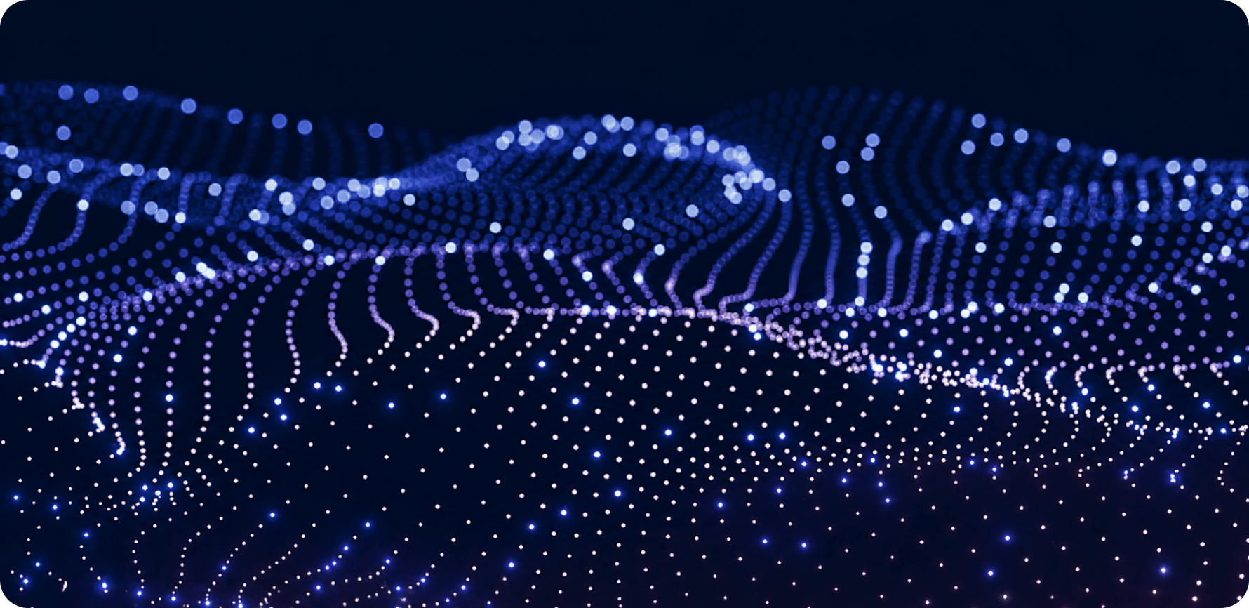 Glowing blue particle wave mesh on a dark navy background